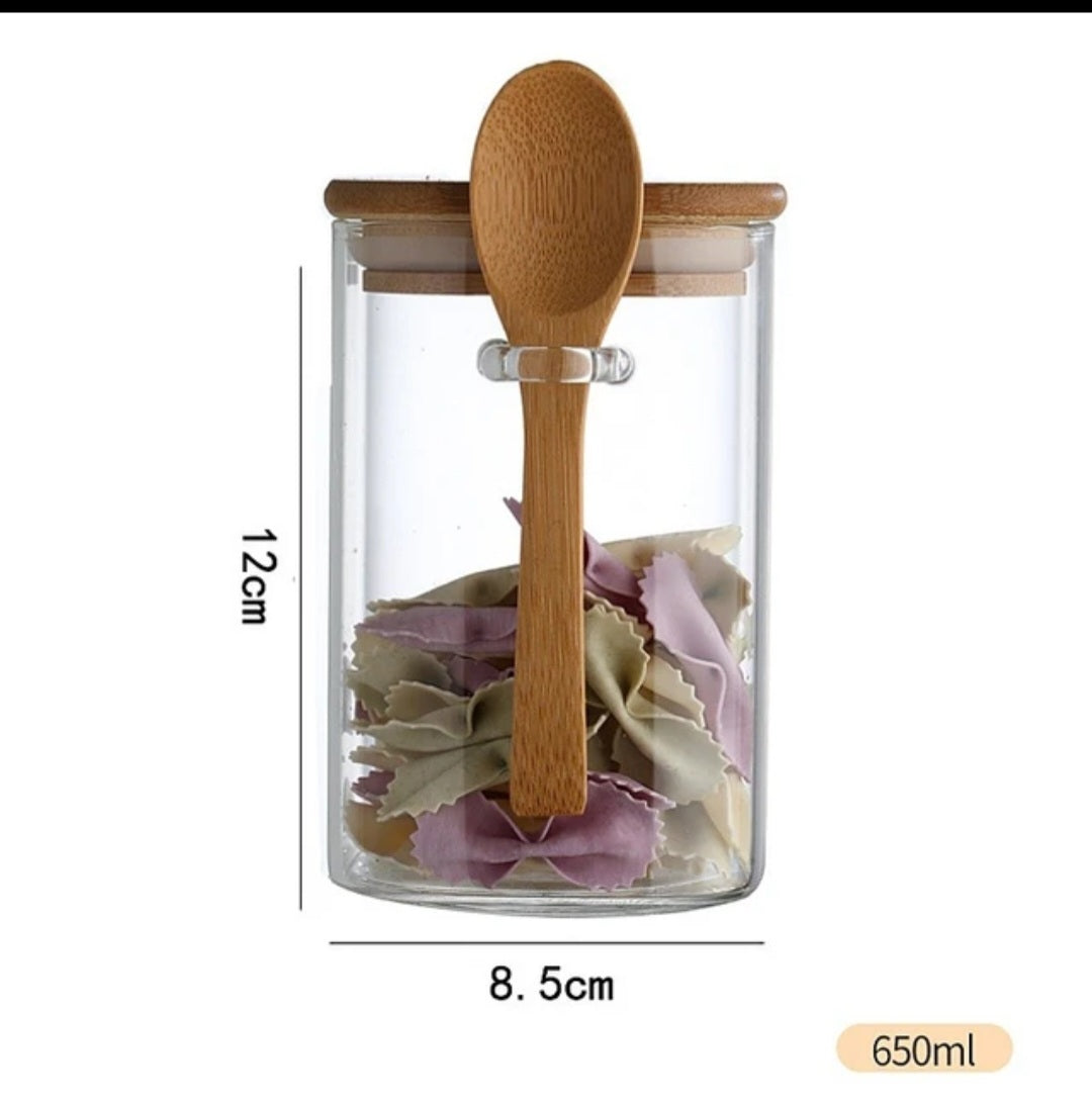 Small glass jars with spoons
