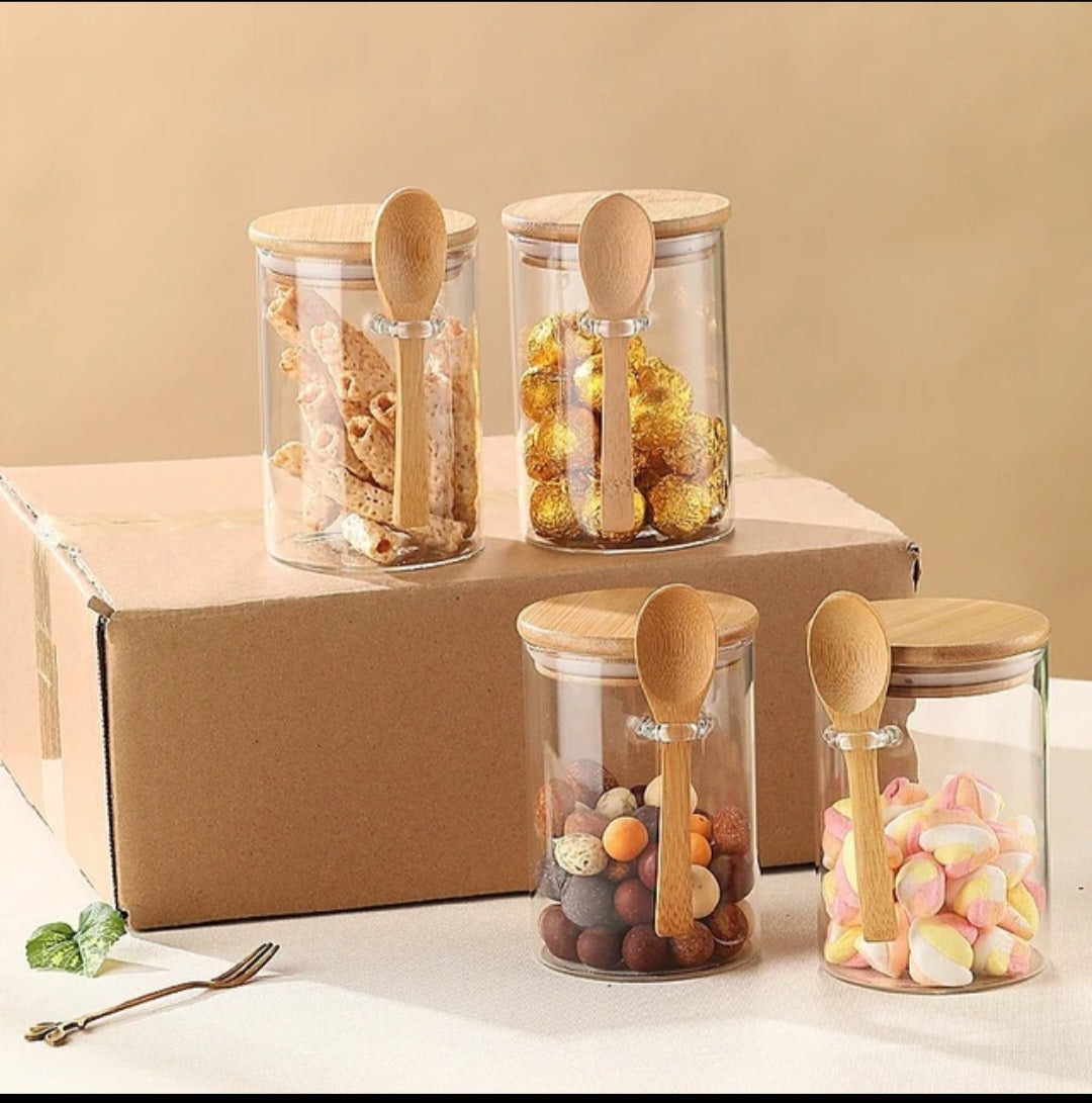 Small glass jars with spoons