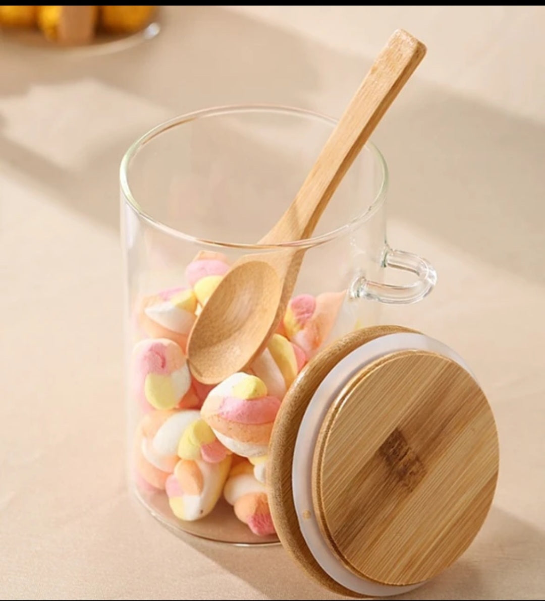 Small glass jars with spoons
