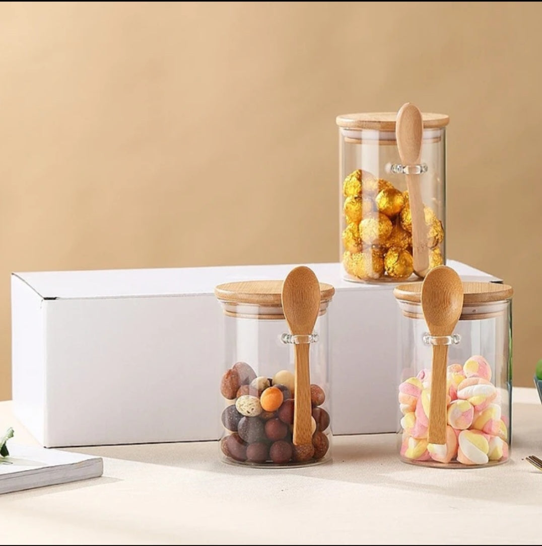 Small glass jars with spoons