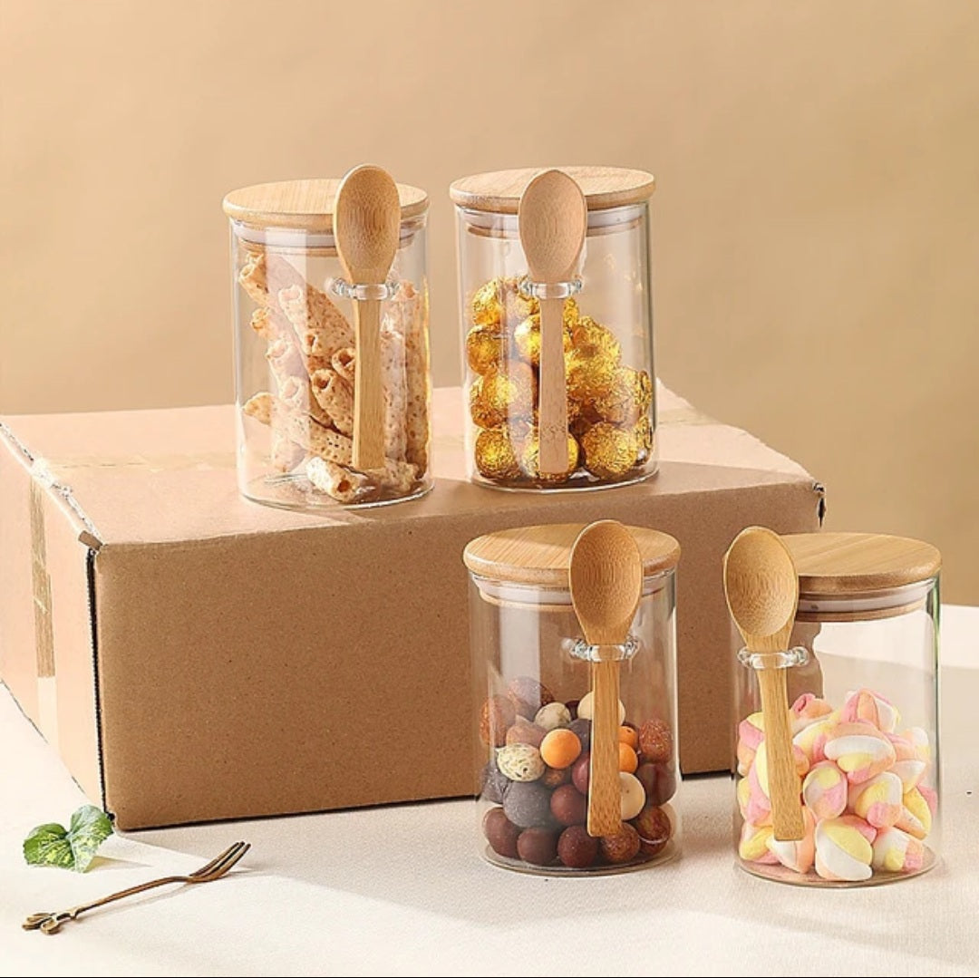 Small glass jars with spoons